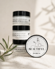 Skincare product with 'Beautiful Company' label on a neutral background